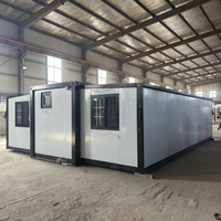 Maison conteneur préfabriquée de luxe à double aile extensible, pré-assemblée en usine, avec aménagement personnalisable pour usage résidentiel, bureautique ou hôtelier