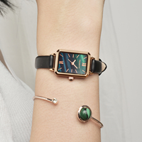 WJ-11038 REBIRTH Nouvelle Montre à Quartz Populaire pour Femme avec Cadran Vert, Bracelet en Cuir, Style Simple et Luxe