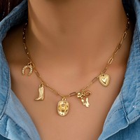 Accessoires Qingdao Comiya : Breloque en alliage en forme de fer à cheval, chapeau en jean, bottes en jean, nœud en forme de cœur, bambou charmant, pendentif multiple