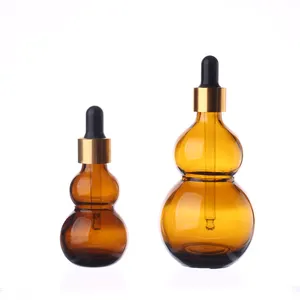 Bottiglia di olio essenziale stampata personalizzata ambra zucca rotonda bottiglia di vetro olio essenziale contagocce
