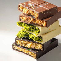 Vente en gros de chocolat aux pistaches célèbres de Dubaï Offre Spéciale Crisp Dubai sauce aux pistaches fourrée au chocolat Confiture croustillante de noix chocolat dubai