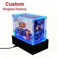 Présentoir LED personnalisé en usine avec base éclairée, vitrine portable en acrylique scellée pour boîte de boosters Pokémon, avec LED et piédestal noir