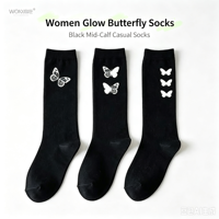 Chaussettes mi-mollet pour femme en jacquard papillon phosphorescent OEM, style streetwear, toutes occasions, chaussettes décontractées en tricot noir, logo personnalisé