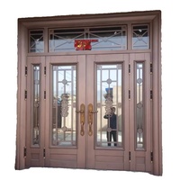Porte d'entrée moderne à double battant en alliage de zinc et verre pour maison auto-construite