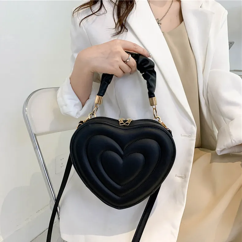 Estate 2023 borse borse da donna borse a tracolla da donna borse e borsette a forma di cuore di moda all'ingrosso borse a mano da donna di lusso