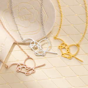 Collana 'Love Yourself' con Cuore in Acciaio Inossidabile Placcato Oro 18k, Gioiello Minimalista K-Pop, Regalo per Lei - Product Image 1