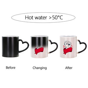 <span class=keywords><strong>Taza</strong></span> mágica <span class=keywords><strong>de</strong></span> café <span class=keywords><strong>de</strong></span> cerámica con mango <span class=keywords><strong>de</strong></span> corazón brillante personalizada con logotipo personalizado <span class=keywords><strong>de</strong></span> 11 15 oz a precios al por mayor que cambia <span class=keywords><strong>de</strong></span> color con el calor - Product Image 2