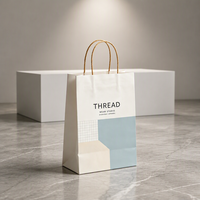 Sac fourre-tout en papier personnalisé de luxe pour les entreprises de vente au détail, sac de shopping en papier blanc, poignée en corde kraft