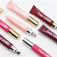 Metal applicator tube met gekleurde lipgloss, fruit lipolië, private label, vegan, transparant, nude, bruin, peptide, vloeibare boterbalsem