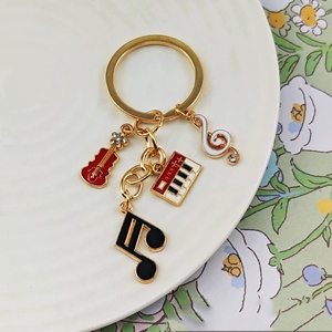 พวงกุญแจโลหะรูปกีตาร์สุดฮิต ดีไซน์เก๋ แฟชั่นสำหรับคนรักดนตรี ใช้ตกแต่งกระเป๋าได้ - Product Image 5