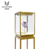 Vitrines en verre durables et abordables MASTER à vendre – Vitrine haute à cadre doré avec serrure pour magasins de luxe et de bijouterie