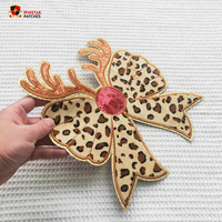 Nouveau personnalisé grand noël imprimé léopard arc paillettes Chenille Sequin broderie découpé au Laser fer sur patchs pour vêtements