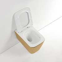 WC suspendu mural en céramique dorée de luxe avec chasse d'eau Tornado pour salle de bain