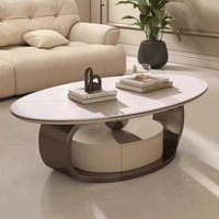 Table basse ovale moderne minimaliste en pierre frittée de luxe italienne avec tiroir pour salon