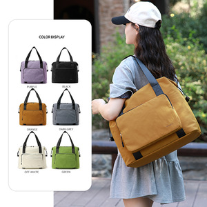 กระเป๋าเดินทางรุ่นใหม่ รับทำโลโก้ หลายสี น้ำหนักเบาพิเศษ กันน้ำ เหมาะสำหรับทริปสั้นๆ หรือวันหยุดสุดสัปดาห์  กระเป๋าเดินทางอเนกประสงค์ - Product Image 1