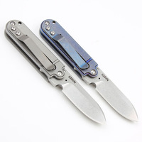 Couteau de camping en plein air en alliage de titane Mini haute dureté lavage de pierre Double Action Edc couteau de poche de chasse