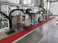 Machine de scellage numérique à haute précision pour sacs plastiques, à moteur PLC et buses pneumatiques, pour l'emballage de produits chimiques, à économie d'énergie