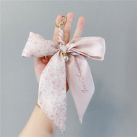 Pendentif de luxe pour sac à main féminin, accessoires de mode, imprimé floral, foulard, perles, porte-clés, nœud