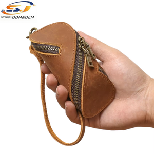 Étui à clés en cuir, mini pochette en cuir <span class=keywords><strong>de</strong></span> <span class=keywords><strong>vachette</strong></span> avec fermeture éclair pour clés <span class=keywords><strong>de</strong></span> voiture et pièces <span class=keywords><strong>de</strong></span> monnaie, personnalisation d'usine - Product Image 1