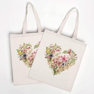 กระเป๋าผ้าแคนวาสทรงหัวใจลายดอกไม้สวยงามสำหรับผู้หญิง ใช้ซ้ำได้ ของขวัญวันวาเลนไทน์แบบกำหนดเอง - Product Image 6