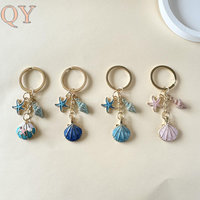 Porte-clés en métal QY Coquillage Étoile de mer, Breloque de sac côtière, Pendentif de sac à main, Anneau de clés tendance, Cadeau pour femme, Accessoires en gros