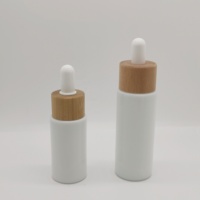 Flacon compte-gouttes en verre cosmétique de haute qualité 30ml 50ml Flacon compte-gouttes en verre à épaule plate opale blanche pour huile essentielle