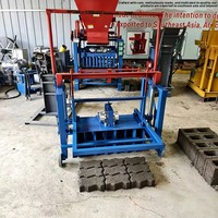 Petite machine à fabriquer des briques en béton de type œuf, à moteur, pour la production de briques rouges et creuses