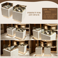 Vitrine de présentation de bijoux en verre carrée moderne avec base en pierre et éclairage LED pour magasin de bijoux