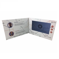 Vente en gros 7 pouces A5 noir LCD vidéo numérique brochure populaire carte de voeux vidéo papier avec conception personnalisée
