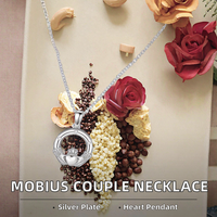 Mobius Collier Pendentif Élégant Collier Fin pour Couples Coeur Attirant la Distance