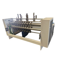 Machine automatique de découpe de carton ondulé pour la fabrication de cloisons et de panneaux de séparation de boîtes en carton