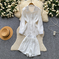 Ensemble deux pièces élégant de style français pour femme : chemise à manches longues et short cintré à la taille, idéal pour les trajets quotidiens en automne