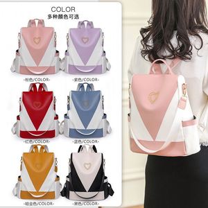 Sac à dos tendance bicolore pour étudiants et activités de plein air avec compartiments spacieux et fonction antivol - Product Image 2