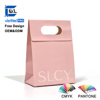 Sacs en papier personnalisés haut de gamme à faible MOQ, simples, avec perforation, pour vêtements, cosmétiques, souvenirs, emballage rose