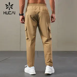 HUCAI personnalisé hommes premium nylon spandex boucle réglable absorption d'humidité séchage rapide cargo sports pantalons d'escalade en plein air