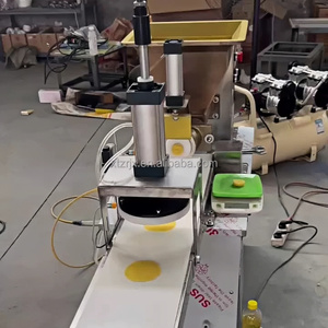 Machine commerciale automatique pour diviser la pâte et presser les pizzas, aplatir les naan, les paratha et les pita, et rouler la pâte - Product Image 2