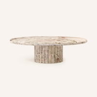 Table basse Dream Home Premium à base sculpturale côtelée, grand plateau rond en marbre, style rustique, pierre naturelle, pour salon