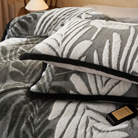 Ensemble de literie 4 pièces en velours de lait touffeté à motif feuille de palmier OEM ODM, taille et logo personnalisés, pour la maison, housse de couette en microfibre pour l'hiver