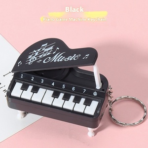 Jincan Factory Wholesale New Mini Bench Piano Keychain Music Piano Game Machine Bag Pendant Educational Toy Gift for Children - Product Image 3