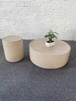 Table en résine texturée en forme de galet arrondi, beige mat, pour projets d'aménagement extérieur, de jardin et de villa