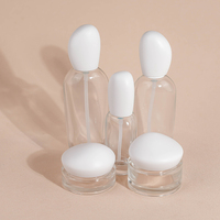 Botol Kaca Kosmetik Silinder 100ml Hitam Matte Mewah dengan Tutup Pipet Berlapis Sablon untuk Krim Perawatan Kulit & Krim Wajah