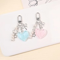 Porte-clés Cœur Étoile Argenté Style Ins avec Nœud Papillon – Pendentif de Sac Simple et Polyvalent