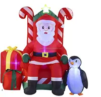 גואנגזו זול גדול חם גדול LED סנטה קלאוס חג המולד אב עם כיסא פרסום מתנפח דגם