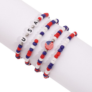 Nuova bandiera americana bracciale lettera acrilica. Braccialetto elastico multistrato di perline per le donne, perfetto per il giorno dell'indipendenza degli Stati Uniti - Product Image 1