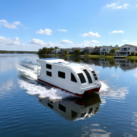 Maison flottante remorquable, cabine mobile avec chambre, toilettes, cuisine, évier, cuisinière intégrée et table pour locations en station balnéaire