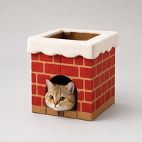 Maison pour chat en carton ondulé avec cheminée, cachette et griffoir, décorée de motifs neige et briques