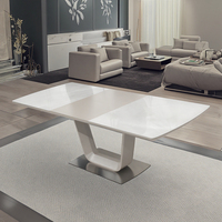 Table à manger rectangulaire de luxe en céramique et pierre frittée, extensible, style nordique moderne, avec plateau en marbre et structure métallique