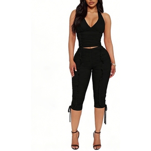 ชุดเซ็ต 2 ชิ้นสำหรับผู้หญิง เสื้อครอปคอ halter แบบรัดรูป และกางเกงขายาวรัดรูป เหมาะสำหรับงานปาร์ตี้และใส่ไปไนต์คลับ แฟชั่น - Product Image 3