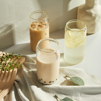 Gobelet en verre transparent avec impression personnalisée de 16oz 20oz pour boire du café et de la bière avec couvercle en plastique et paille en verre