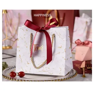 Sac fourre-tout de remerciement marbré personnalisé sac cadeau de luxe en or sac en papier de mariage fantaisie avec nœud ruban